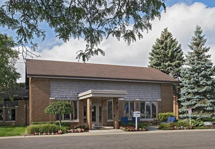 Exterior shot of American House East II, a senior living community in Roseville, Michigan